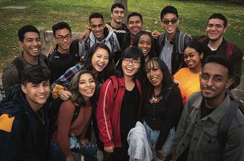 group of smiling students viewed from above