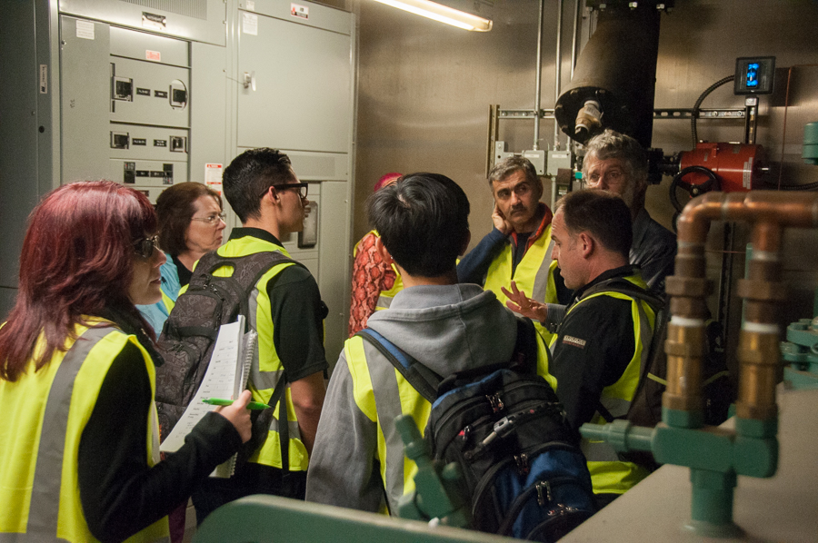 students in building control room