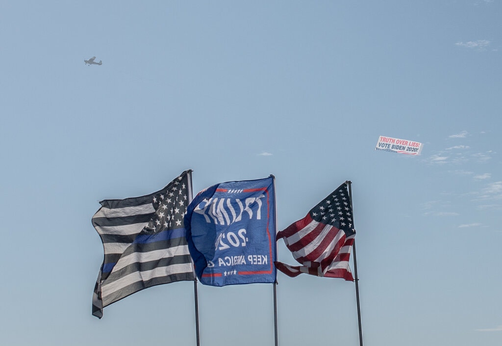 US flags and Trump flag