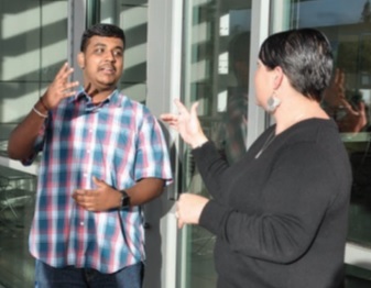 students using sign language